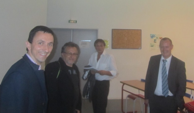 Norbert Giambiasi in PhD Committee with Miquel Angel Piera and other Colleagues